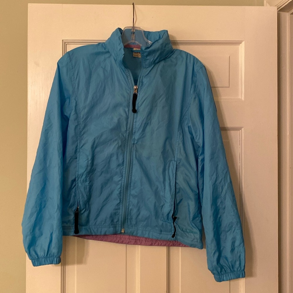 L.L.Bean XS windbreaker with stowaway pocket and rollaway hood.